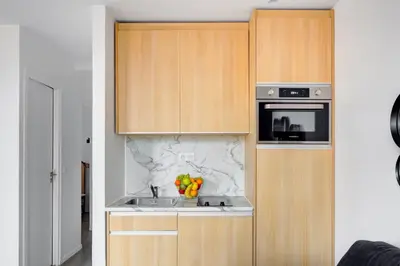 Cuisine ou kitchenette dans l'établissement 153 Suite Mylene - Superbe Appartement à Paris