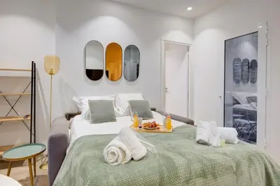 Un ou plusieurs lits dans un hébergement de l'établissement 158 Suite Jeremy - Superbe Appartement à Paris