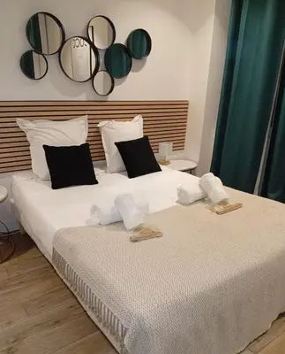 Un ou plusieurs lits dans un hébergement de l'établissement 152 Suite Sylvie - Superbe Appartement à Paris