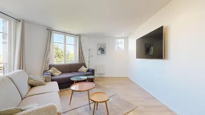 Télévision ou salle de divertissement dans l'établissement 157 Suite Sacha - Superbe Duplex à Paris