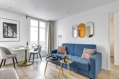 Coin salon dans l'établissement 156 Suite Marlene - Superbe Appartement à Paris.