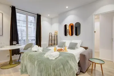 Un ou plusieurs lits dans un hébergement de l'établissement 160 Suite Eve - Superbe Appartement à Paris