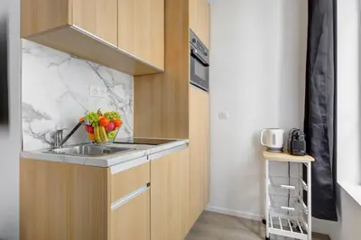 Cuisine ou kitchenette dans l'établissement 160 Suite Eve - Superbe Appartement à Paris