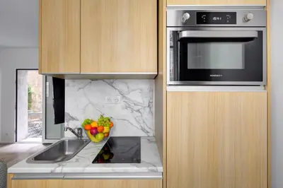 Cuisine ou kitchenette dans l'établissement 160 Suite Eve - Superbe Appartement à Paris