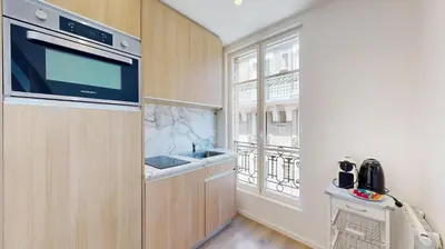 Cuisine ou kitchenette dans l'établissement 162 Suite Benjamin - Superbe Appartement à Paris