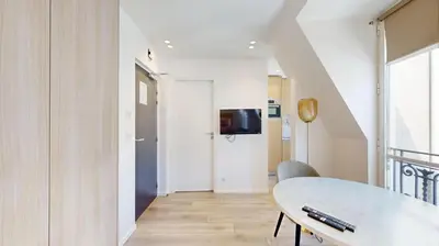 Télévision ou salle de divertissement dans l'établissement 162 Suite Benjamin - Superbe Appartement à Paris