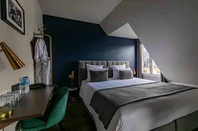 Un ou plusieurs lits dans un hébergement de l'établissement Maison Barbès
