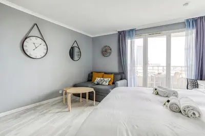 Un ou plusieurs lits dans un hébergement de l'établissement Joli studio à Courbevoie - La Defense