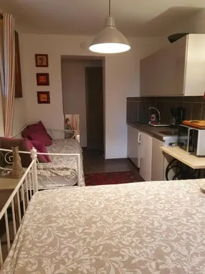 Cuisine ou kitchenette dans l'établissement La Romantique