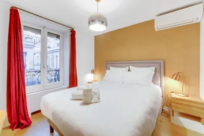 Un ou plusieurs lits dans un hébergement de l'établissement Les appartements de l'atelier Paris 15