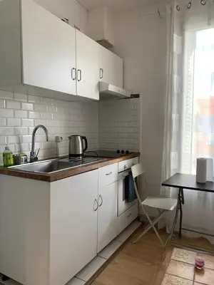 Cuisine ou kitchenette dans l'établissement 3 Hebergements à 5 minutes de Paris et 30 MN Stade de France