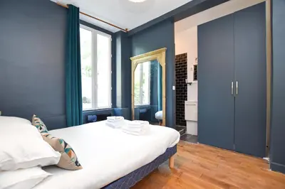 Un ou plusieurs lits dans un hébergement de l'établissement Cosy apartment - 1BR-4P - Place de la Bastille