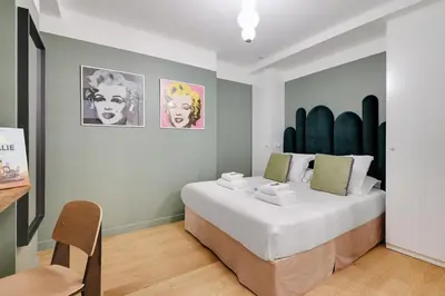 Un ou plusieurs lits dans un hébergement de l'établissement Bastille - Cosy design 1BR / 4P apartment