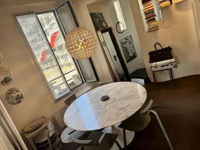 Cuisine ou kitchenette dans l'établissement duplex top central Marais