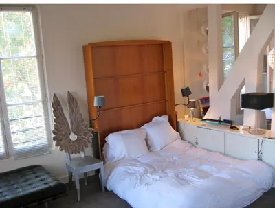 Un ou plusieurs lits dans un hébergement de l'établissement duplex top central Marais