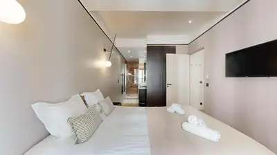 Un ou plusieurs lits dans un hébergement de l'établissement 167 Suite K - Superbe Appartement à Paris