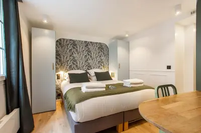 Un ou plusieurs lits dans un hébergement de l'établissement Charming apartment - 1BR-4P - Le Marais