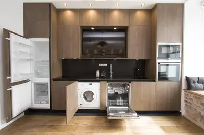 Cuisine ou kitchenette dans l'établissement The Designer Apartment