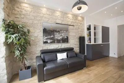 Coin salon dans l'établissement The Designer Apartment