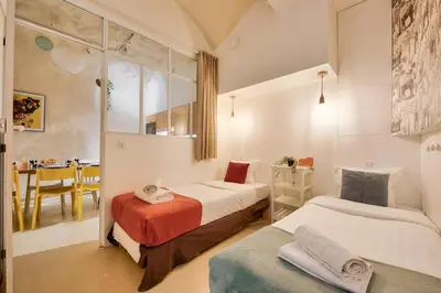 Un ou plusieurs lits dans un hébergement de l'établissement New Stunning 4 Bdrs Apt, With AC – Le Marais