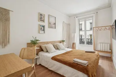 Un ou plusieurs lits dans un hébergement de l'établissement Villa Arc de Triomphe