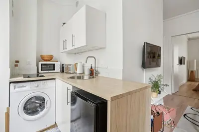 Cuisine ou kitchenette dans l'établissement Villa Arc de Triomphe