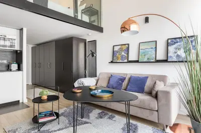 Coin salon dans l'établissement B2 Loft Duplex 175Blo-Paris Convention