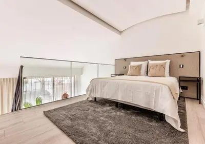 Un ou plusieurs lits dans un hébergement de l'établissement B3 Loft Duplex 175Blo-Paris Convention