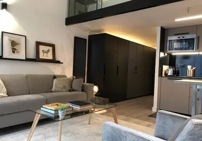 Coin salon dans l'établissement B3 Loft Duplex 175Blo-Paris Convention