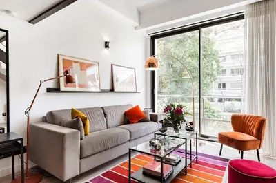 Coin salon dans l'établissement B4 Loft Duplex 175Blo-Paris Convention