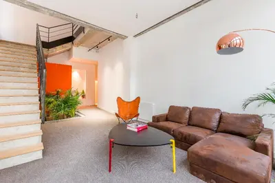 Coin salon dans l'établissement B6 Loft Duplex 175Blo-Paris Convention