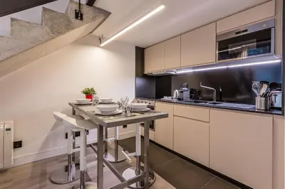 Cuisine ou kitchenette dans l'établissement B6 Loft Duplex 175Blo-Paris Convention