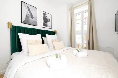 Un ou plusieurs lits dans un hébergement de l'établissement Luxury home in PARIS - Musée du Louvre