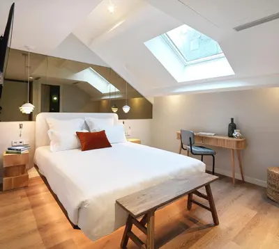 Un ou plusieurs lits dans un hébergement de l'établissement Le Katorze Hôtel
