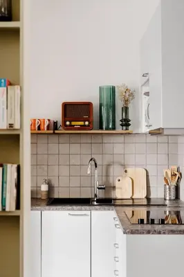 Cuisine ou kitchenette dans l'établissement Edgar Suites Louvre - Saint-Honoré