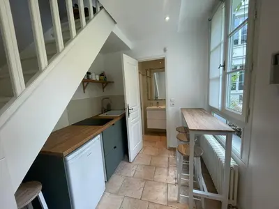 Cuisine ou kitchenette dans l'établissement Les Jardins du Panthéon
