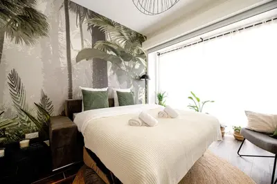 Un ou plusieurs lits dans un hébergement de l'établissement Luxury home near Tour Eiffel