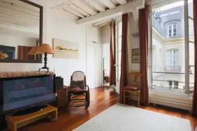 Un ou plusieurs lits dans un hébergement de l'établissement Duplex St-Michel - Quartier latin