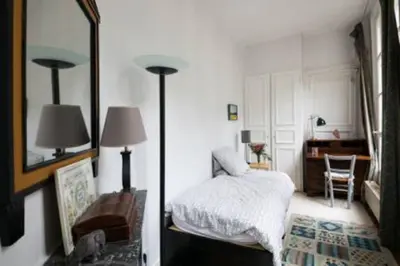 Un ou plusieurs lits dans un hébergement de l'établissement Duplex St-Michel - Quartier latin