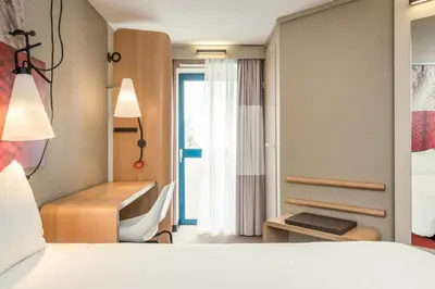Un ou plusieurs lits dans un hébergement de l'établissement Ibis Paris Gare Montparnasse 15ème