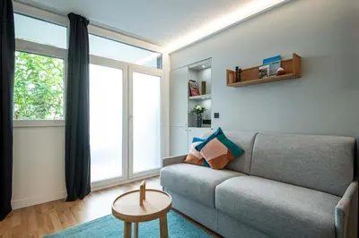 Coin salon dans l'établissement NEW - Superbe 1 Bdr Appt - Design 60'S - Paris 15e
