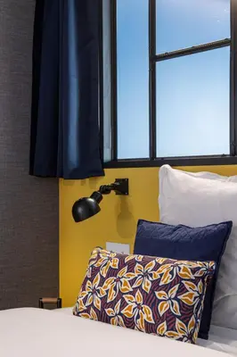 Un ou plusieurs lits dans un hébergement de l'établissement NEW - Appt style le Corbusier avec Balcon - 8 pers