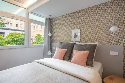 Un ou plusieurs lits dans un hébergement de l'établissement NEW - Villa Urbaine au Coeur de Paris - 6 pers