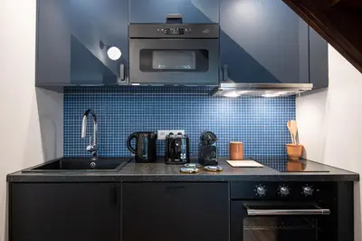 Cuisine ou kitchenette dans l'établissement NEW - Villa Urbaine au Coeur de Paris - 6 pers