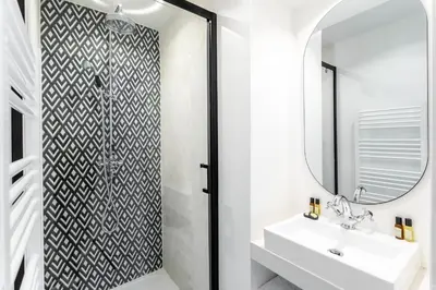 Salle de bains dans l'établissement Habitat Parisien - 2BR-2BA - Marais - Hôtel de Ville
