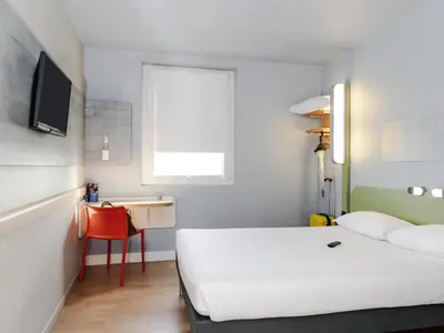 Un ou plusieurs lits dans un hébergement de l'établissement ibis budget Paris Porte de Vanves