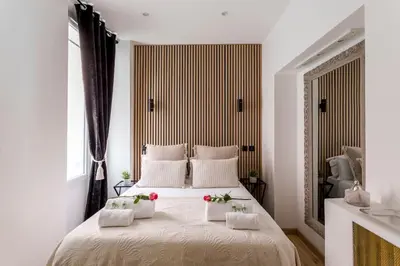 Un ou plusieurs lits dans un hébergement de l'établissement Suite Paris, Tour Eiffel, Champs Elysées