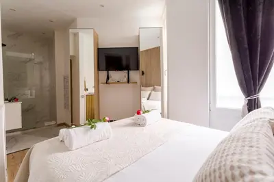 Un ou plusieurs lits dans un hébergement de l'établissement Suite Paris, Tour Eiffel, Champs Elysées