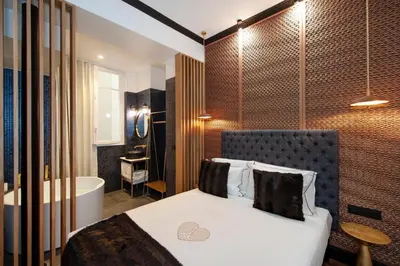 Un ou plusieurs lits dans un hébergement de l'établissement LE MARAIS PRESTIGE Luxueux - Cosy - Wifi