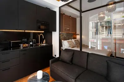 Cuisine ou kitchenette dans l'établissement LE MARAIS PRESTIGE Luxueux - Cosy - Wifi